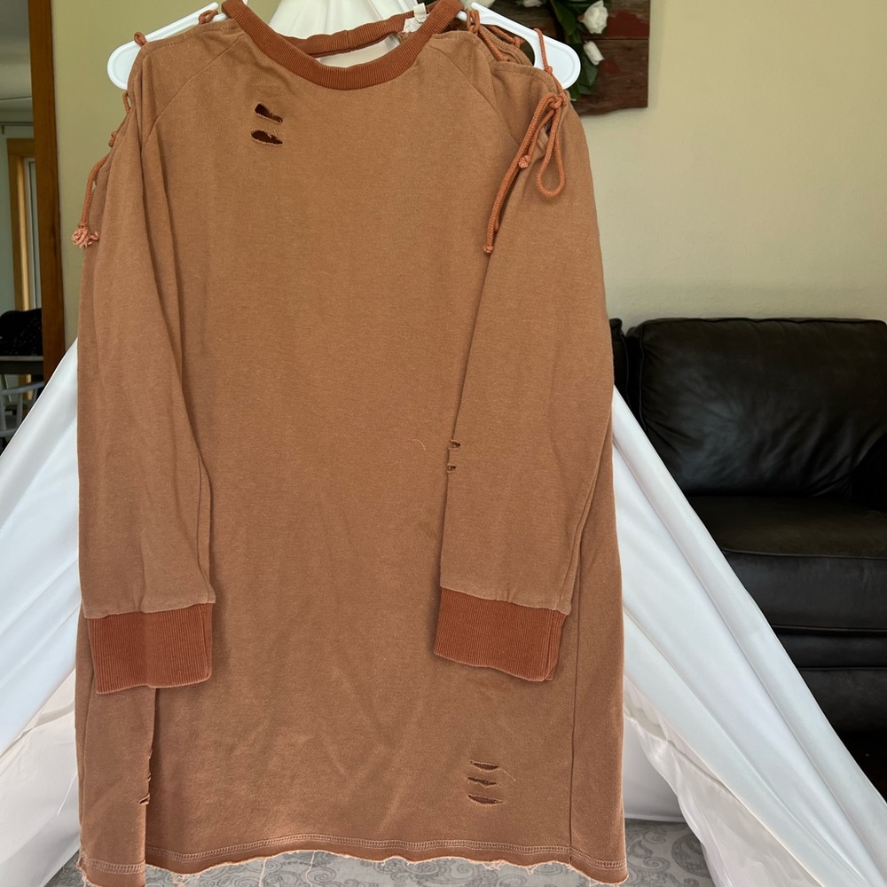 Distressed tunic with lace up cold shoulder detail